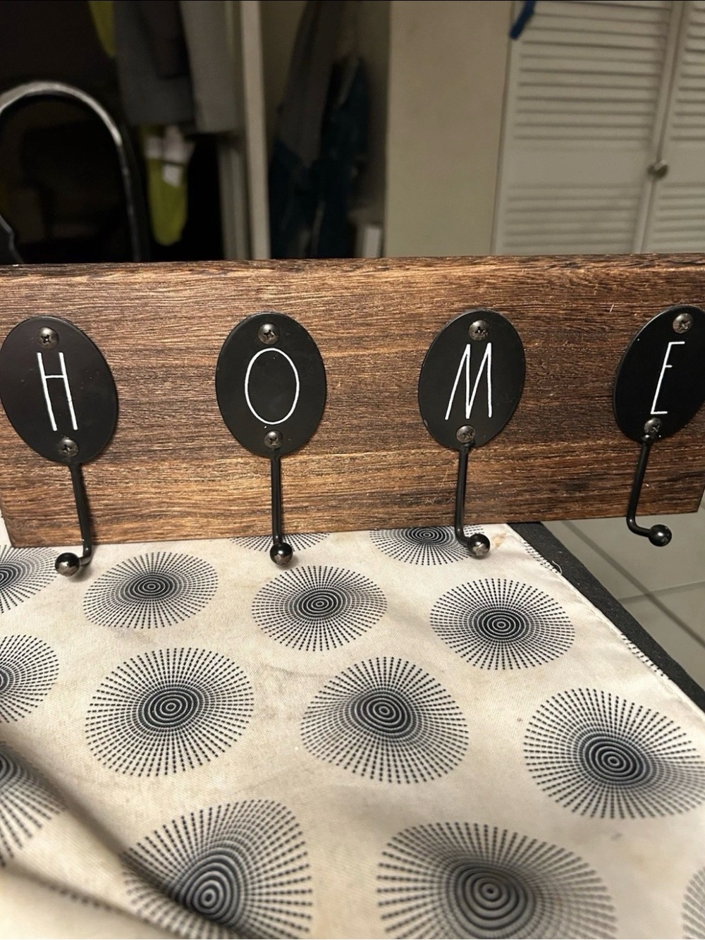 Rustic Brown Wood Wall Hook Rack with Black Lettered Accents